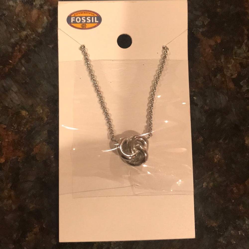 Fossil silver knot pendent